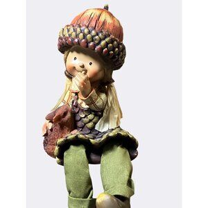 Autumn Themed Resin Figurine Girl Wearing Hat Holding A Squirrels Shelf Sitter